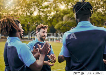 Men, sports or applause rugby team on fitness break, exercise workout or talking in training game. Clapping, friends success or happy group of athletes bonding or speaking in practice match together 131798600