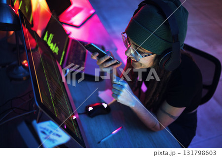 Night, phone call or girl hacker by computer...の写真素材 [131798603] - PIXTA