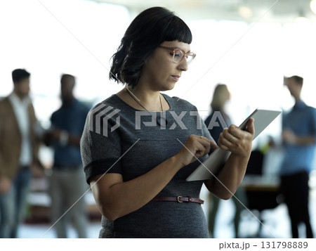 Technology, leadership and woman with tablet reading email, sales or social media on web. Research, leader and b2b, company ceo networking with online communication in management at startup office. 131798889
