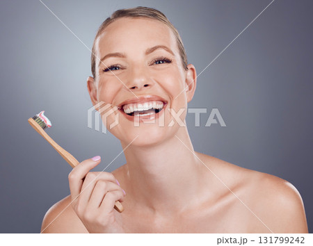 Bamboo toothbrush, happy portrait and woman for dental wellness, healthy cleaning and face cosmetics. Female teeth, eco wooden brush and toothpaste for mouth smile, mature model and studio background Bamboo toothbrush, happy portrait and woman for dental wellness, healthy cleaning and face cosmetics. Female teeth, eco wooden brush and toothpaste for mouth smile, mature model and studio background 131799242