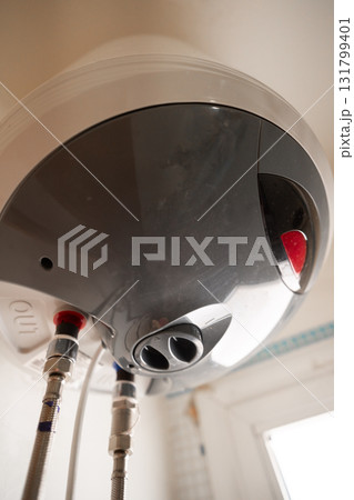 Modern house water heater control panel. The fall of the cold weather and the rise in consumer prices. Modern house water heater control panel. The fall of the cold weather and the rise in consumer prices. 131799401