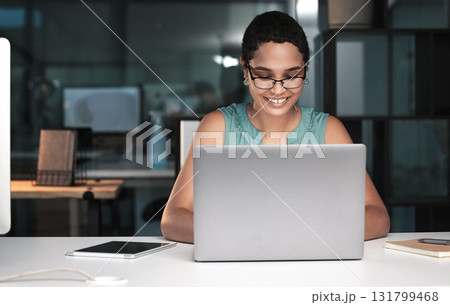 Office laptop, happy woman and night work on overtime article for social media app, digital website or online blog. Employee inspiration, reading internet info and African journalist typing news post Office laptop, happy woman and night work on overtime article for social media app, digital website or online blog. Employee inspiration, reading internet info and African journalist typing news post 131799468
