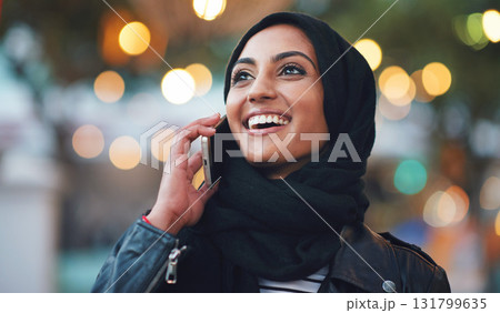 Muslim, phone call and woman talking in city, chatting or speaking to contact in Dubai. Night bokeh, thinking or happy Islamic girl on 5g mobile smartphone for networking or conversation with hijab Muslim, phone call and woman talking in city, chatting or speaking to contact in Dubai. Night bokeh, thinking or happy Islamic girl on 5g mobile smartphone for networking or conversation with hijab 131799635