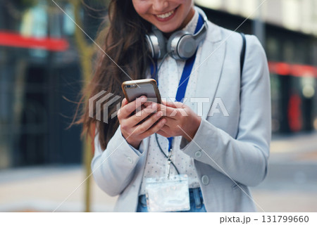 Business woman, hands and phone with smile in communication, social media or texting in city. Hand of female typing and smiling on smartphone for 5G connection, mobile app or browsing in networking Business woman, hands and phone with smile in communication, social media or texting in city. Hand of female typing and smiling on smartphone for 5G connection, mobile app or browsing in networking 131799660