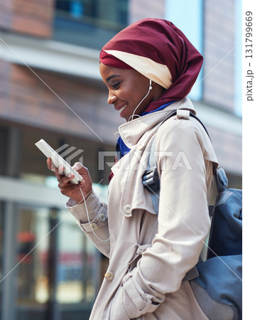 Smile, phone or travel black woman in city typing and walking, networking or on 5g mobile app in New York. Independent professional in the street on smartphone for communication or commute to office 131799669