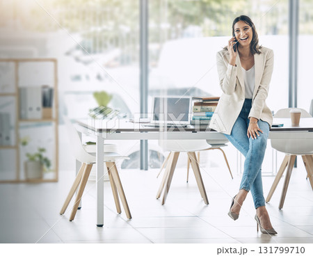 Business woman, laughing on phone call at office company or corporate startup for design and networking. Smile, happy and talking worker on mobile communication technology for funny negotiation Business woman, laughing on phone call at office company or corporate startup for design and networking. Smile, happy and talking worker on mobile communication technology for funny negotiation 131799710