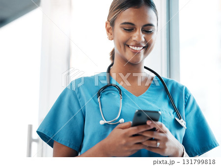 Nursing, social media and doctor with a phone for communication, email and schedule. Medicine, internet and woman nurse typing on a mobile for an app chat, healthcare research and conversation 131799818