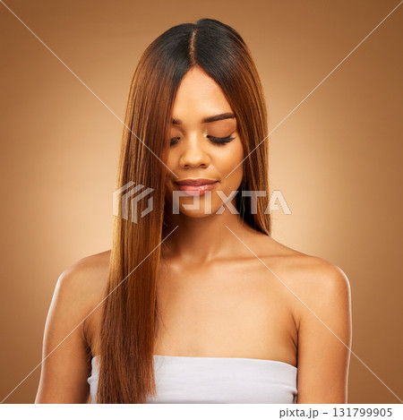 Hair care, straight and beauty of woman in studio for growth and color shine or healthy texture. Aesthetic female face for natural makeup cosmetics, hairdresser or salon mockup on a brown background Hair care, straight and beauty of woman in studio for growth and color shine or healthy texture. Aesthetic female face for natural makeup cosmetics, hairdresser or salon mockup on a brown background 131799905