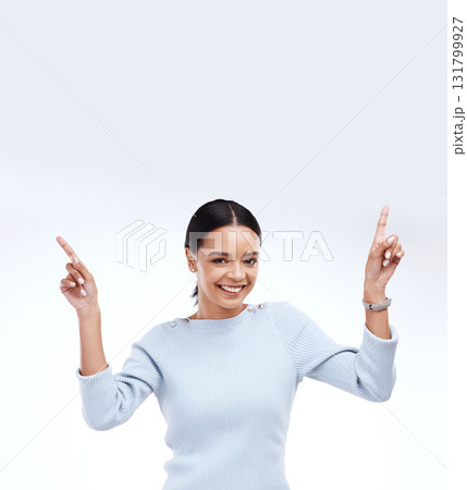 Mock up woman, portrait smile and pointing up at retail promo information, empty branding space or advertisement mockup. Direction, female presentation or studio model isolated on white background 131799927