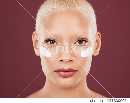 Skincare, beauty and portrait of woman with lotion on face, cosmetics and skin product on studio background. Dermatology, facial treatment and model isolated with mock up, anti ageing care and glow 131800061
