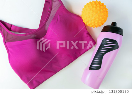 Concept of sports lifestyle and sports activities. Flat lay of sports top bra and drinking bottle. 131800150
