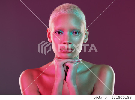Skincare, beauty and portrait of woman with neon makeup and lights in creative advertising on studio background. Cyberpunk, product placement and model isolated for futuristic skin care mockup space. Skincare, beauty and portrait of woman with neon makeup and lights in creative advertising on studio background. Cyberpunk, product placement and model isolated for futuristic skin care mockup space. 131800185