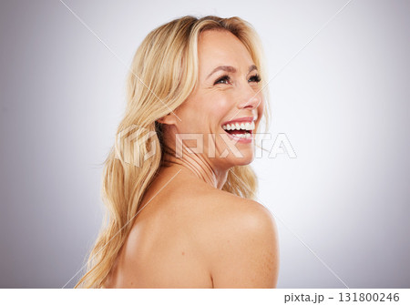 Happy, skincare and mature woman in studio for beauty, wellness and grooming on grey background space. Cosmetic, body care and female model relax in luxury, hygiene and dermatology while isolated 131800246