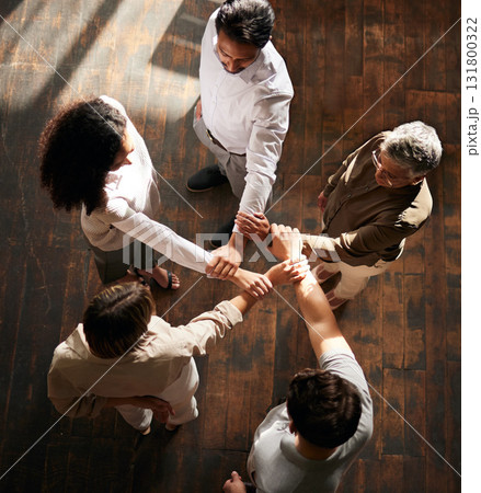 Teamwork, strong and people with linked hands in support, collaboration or team building power in business startup. Group circle, women or connected men in hand synergy sign for solidarity from above Teamwork, strong and people with linked hands in support, collaboration or team building power in business startup. Group circle, women or connected men in hand synergy sign for solidarity from above 131800322