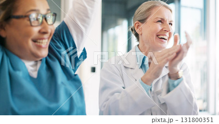 Medical, team celebration and doctors applause, praise or congratulation for mission success, healthcare or meeting news. Teamwork, winner or hospital nurses, surgeon or excited for achievement Medical, team celebration and doctors applause, praise or congratulation for mission success, healthcare or meeting news. Teamwork, winner or hospital nurses, surgeon or excited for achievement 131800351
