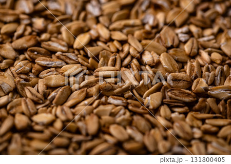 Textured brown flax seeds close-up background Textured brown flax seeds close-up background 131800405