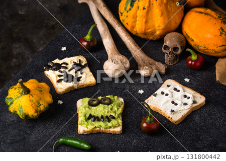 Halloween food for children, monsters toasts 131800442