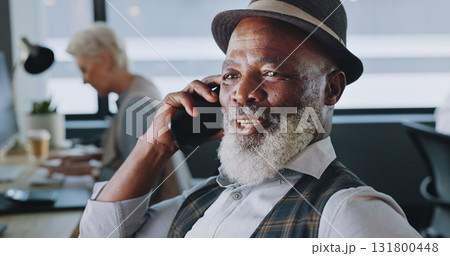 Mature man, talking and phone in office, business and startup by professional, corporate and entrepreneur. Black businessman, smile and communication at job, motivated and happy on hearing good news 131800448