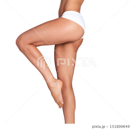 Legs, beauty and woman with mockup in studio for skincare, smooth and soft perfection on white background. Feet, leg and girl model relax in underwear for skin, glow or luxury wellness while isolated Legs, beauty and woman with mockup in studio for skincare, smooth and soft perfection on white background. Feet, leg and girl model relax in underwear for skin, glow or luxury wellness while isolated 131800649