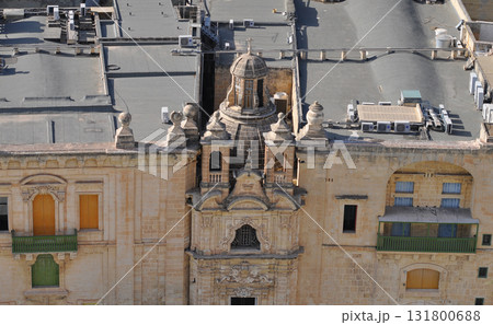 View of old building with windows, balconies in city. Republic of Malta, the picturesque city of Valetta, Malta. View of old building with windows, balconies in city. Republic of Malta, the picturesque city of Valetta, Malta. 131800688