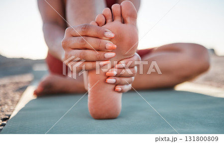 Beach, yoga and woman stretching foot, feet or legs for cardio exercise, outdoor pilates training or body healthcare goals. Nature freedom, calm peace or athlete warm up for fitness workout on ground Beach, yoga and woman stretching foot, feet or legs for cardio exercise, outdoor pilates training or body healthcare goals. Nature freedom, calm peace or athlete warm up for fitness workout on ground 131800809