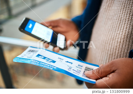 Plane ticket, flight check and black man hands holding airplane paper documents and phone. Digital app, networking and airport document for travel schedule with male holding barcode information Plane ticket, flight check and black man hands holding airplane paper documents and phone. Digital app, networking and airport document for travel schedule with male holding barcode information 131800999