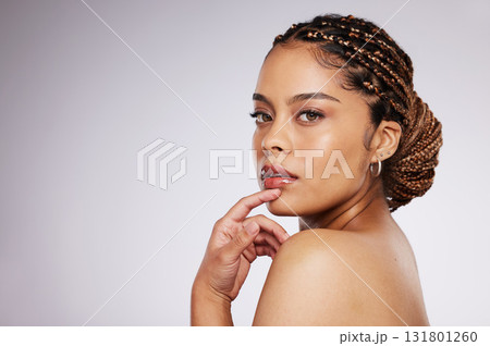 Beauty, face and black woman with skincare in portrait, skin glow and cosmetic care on studio background. Natural cosmetics, hand and makeup with wellness, mockup space and dermatology with shine Beauty, face and black woman with skincare in portrait, skin glow and cosmetic care on studio background. Natural cosmetics, hand and makeup with wellness, mockup space and dermatology with shine 131801260