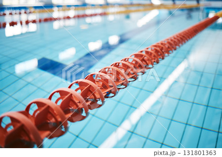 Water, empty swimming pool and lanes for competition, exercise and workout. Sports, swim and fitness with lane ropes or divider in liquid for aquatic training, exercising or underwater practice. 131801363