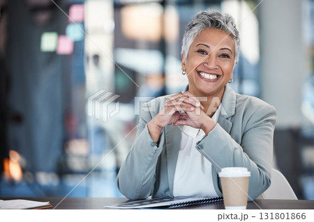 Smile, executive and portrait of a woman in business for working, success and goals. Corporate, happy and mature office employee sitting at a desk to start work in the morning at a legal company Smile, executive and portrait of a woman in business for working, success and goals. Corporate, happy and mature office employee sitting at a desk to start work in the morning at a legal company 131801866