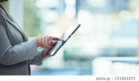 Tablet, business woman hands and accounting search in office for corporate tax data and mockup. Financial analyst, compliance research and fintech analytics of a female employee working with mock up Tablet, business woman hands and accounting search in office for corporate tax data and mockup. Financial analyst, compliance research and fintech analytics of a female employee working with mock up 131801872