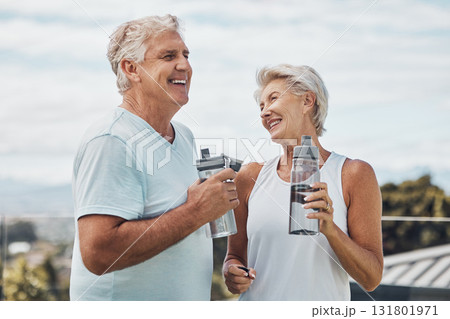 Senior couple, fitness and water bottle with smile for hydration or thirst after workout, exercise or training in nature. Happy elderly man and woman smiling for natural refreshment from exercising 131801971