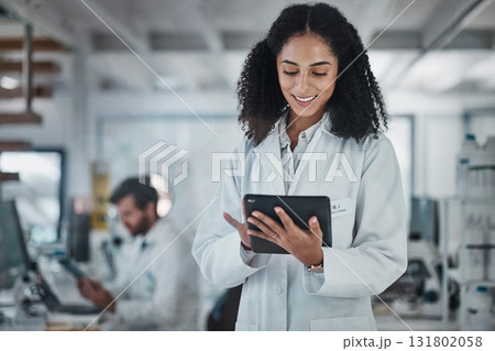 Science, research and black woman with tablet, smile and internet in laboratory with medical data. Healthcare, pharmaceutical innovation and scientist, technology and reading email, website or result 131802058