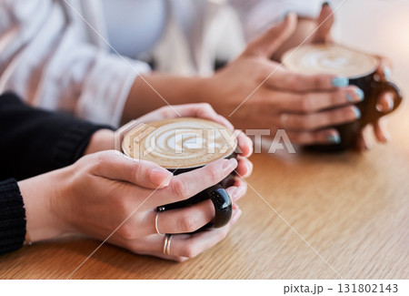 Coffee, morning and hands of people with cups at a cafe for bonding, breakfast and conversation. Restaurant, relax and friends drinking a latte, warm beverage or drink from a mug at a diner together 131802143