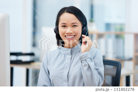 Woman, call center and happy in portrait, communication and CRM, headset with mic in office. Contact us, customer service or telemarketing, Asian female consultant with smile and help desk Woman, call center and happy in portrait, communication and CRM, headset with mic in office. Contact us, customer service or telemarketing, Asian female consultant with smile and help desk 131802276