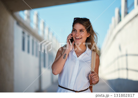 Phone call, happy and woman on a city for travel, vacation and sightseeing, explore and adventure. Smartphone, conversation and excited girl walking in town, cheerful and having fun on a solo trip Phone call, happy and woman on a city for travel, vacation and sightseeing, explore and adventure. Smartphone, conversation and excited girl walking in town, cheerful and having fun on a solo trip 131802817