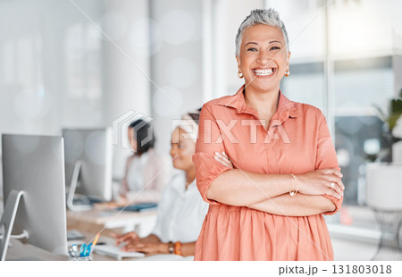 Leadership, arms crossed and smile of business woman in office ready for goals. Ceo, portrait and senior female entrepreneur from India with vision, mission and success mindset in company workplace. 131803018