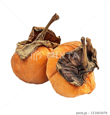 Two ripe persimmons showcase orange skin and wrinkled dry leaves on transparent background Two ripe persimmons showcase orange skin and wrinkled dry leaves on transparent background 131803079