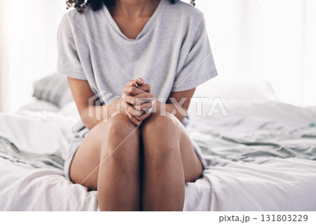 Wake up, morning and woman sitting on bed while sad with depression, anxiety or thinking. Mental health, thoughtful and girl in the bedroom for sleep with insomnia and frustrated with fatigue 131803229