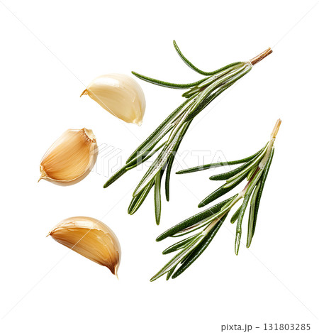 Closeup of fresh garlic cloves and rosemary sprigs arranged artfully on transparent background 131803285