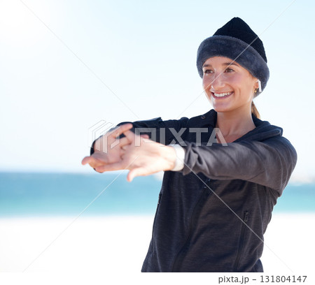 Fitness, woman and stretching arms on beach in preparation for exercise, cardio workout or training. Happy sporty female in warm up arm stretch getting ready for fun exercising by the ocean on mockup Fitness, woman and stretching arms on beach in preparation for exercise, cardio workout or training. Happy sporty female in warm up arm stretch getting ready for fun exercising by the ocean on mockup 131804147