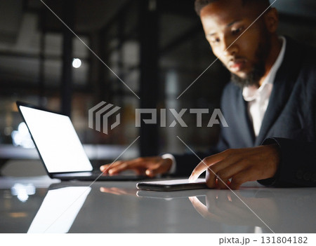 Laptop screen, phone and black man at night for fintech management, trading and stock market data analysis. Finance, accounting and business person with omnichannel for global investment and mockup Laptop screen, phone and black man at night for fintech management, trading and stock market data analysis. Finance, accounting and business person with omnichannel for global investment and mockup 131804182