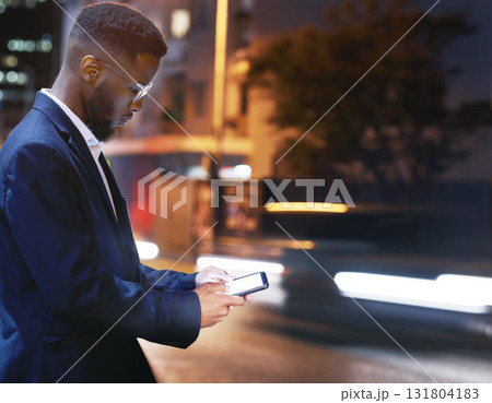 Phone, business and black man in city at night, street or outdoors in town for texting. 5g mockup, technology and male employee with smartphone for social media, internet browsing or web scrolling. Phone, business and black man in city at night, street or outdoors in town for texting. 5g mockup, technology and male employee with smartphone for social media, internet browsing or web scrolling. 131804183