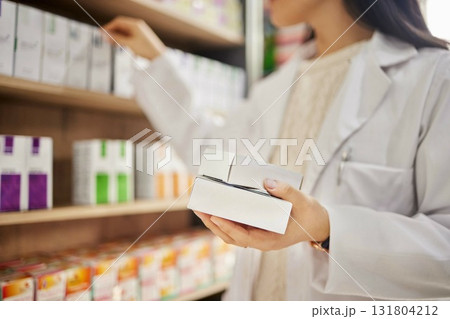 Pharmacy, tablet box in hand and woman pharmacist in drug store, pills choice and medical healthcare. Prescription drugs, health and treatment for illness, pharmaceutical and medicine professional Pharmacy, tablet box in hand and woman pharmacist in drug store, pills choice and medical healthcare. Prescription drugs, health and treatment for illness, pharmaceutical and medicine professional 131804212