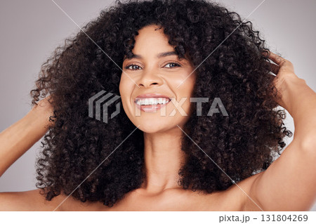 Portrait, beauty and afro with a model black woman in studio on a gray background for natural hair or skincare. Face, salon or Brazil girl happy with smile for health, beauty or facial treatment Portrait, beauty and afro with a model black woman in studio on a gray background for natural hair or skincare. Face, salon or Brazil girl happy with smile for health, beauty or facial treatment 131804269