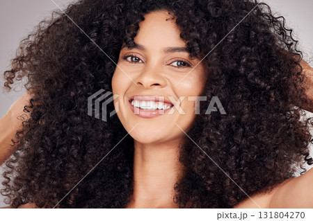 Smile, skincare or portrait of black woman in a studio with natural hair, cosmetic or face routine. Health wellness, beauty or Puerto Rico girl model for facial makeup isolated by grey background Smile, skincare or portrait of black woman in a studio with natural hair, cosmetic or face routine. Health wellness, beauty or Puerto Rico girl model for facial makeup isolated by grey background 131804270