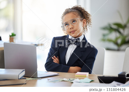 Bored, kid and thinking with pretend office work and laptop with ideas. Job, child and little girl playing dress up as working executive at desk with paperwork and eyes rolling feeling annoyed 131804426