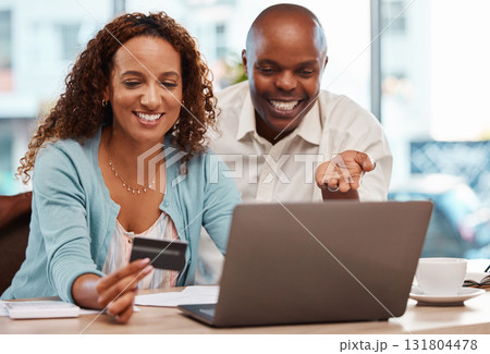 Laptop, credit card and couple online shopping in home, payment or digital banking. Ecommerce, computer and happy black man and mature woman with fintech, sales or interracial purchase on web store. 131804478