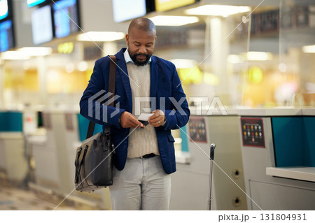 Black man, airport and passport with plane ticket ready for travel, departure or flight time by help desk. African American male waiting at airline terminal with documents for traveling services 131804931