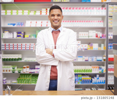 Pharmacy, smile and confidence, portrait of man at drugstore counter, customer service and medical advice in Brazil. Prescription drugs, pharmacist and inventory of pills and medicine at checkout. Pharmacy, smile and confidence, portrait of man at drugstore counter, customer service and medical advice in Brazil. Prescription drugs, pharmacist and inventory of pills and medicine at checkout. 131805148
