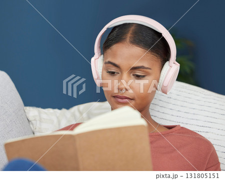 Woman, music headphones and reading book on home sofa to relax, study and for peace in living room. Face of young female student on couch to read for knowledge, education and language on couch Woman, music headphones and reading book on home sofa to relax, study and for peace in living room. Face of young female student on couch to read for knowledge, education and language on couch 131805151
